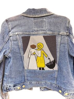 Light-wash blue denim jacket, custom-embroidered